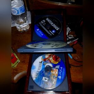 Box of ps4 gaming DVDs